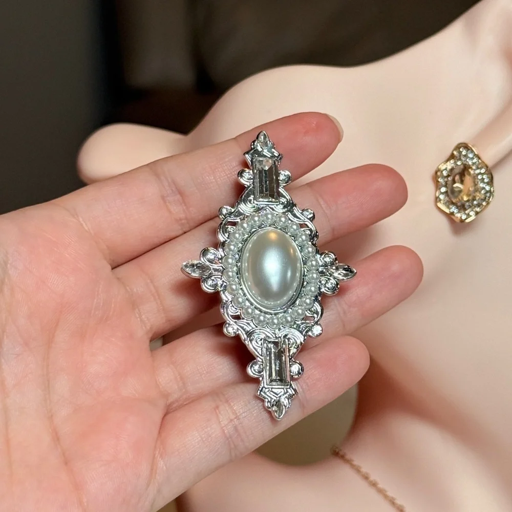 Elegant Silver and Pearl Brooch